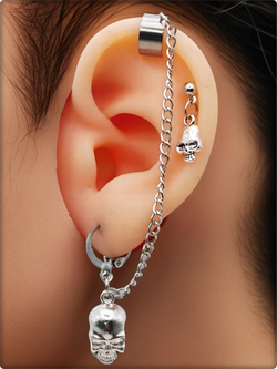 Набор сережек с клипсой "Черепа" серебристые.