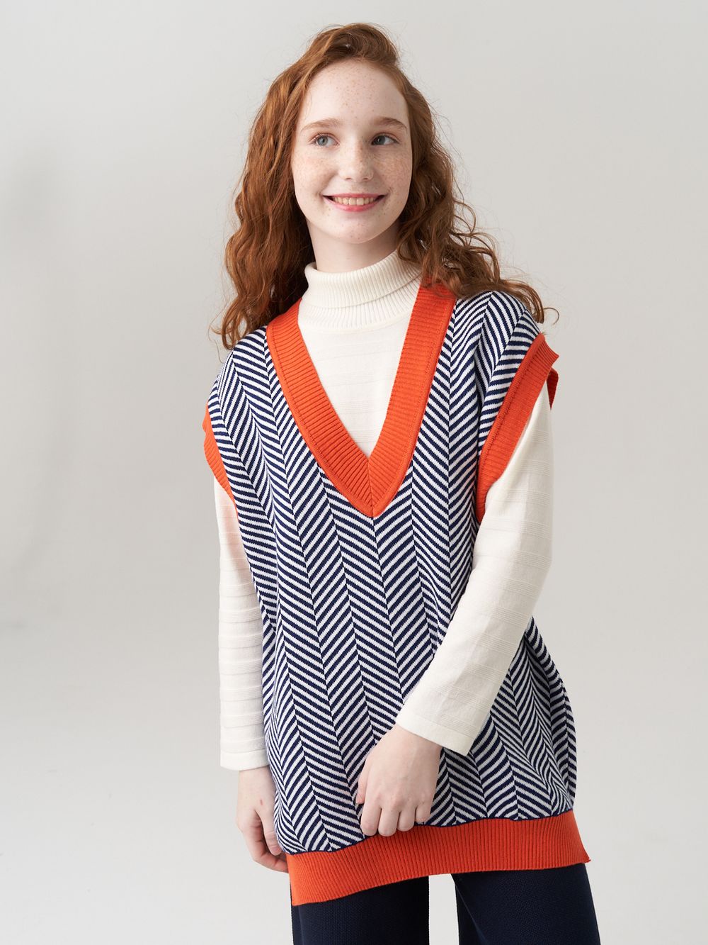 Жилетка для девочки в школу 953 н.синий-оранжевый