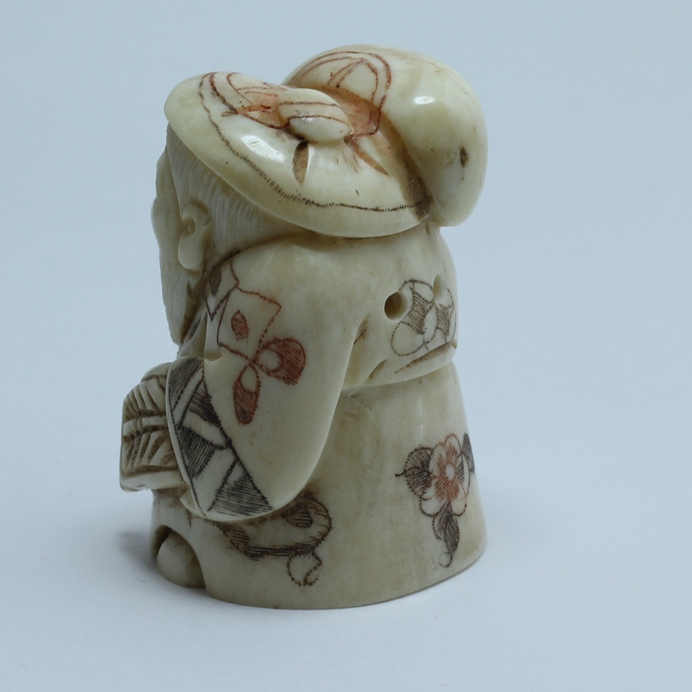 Нэцкэ Дзюродзин с мешком риса и веером