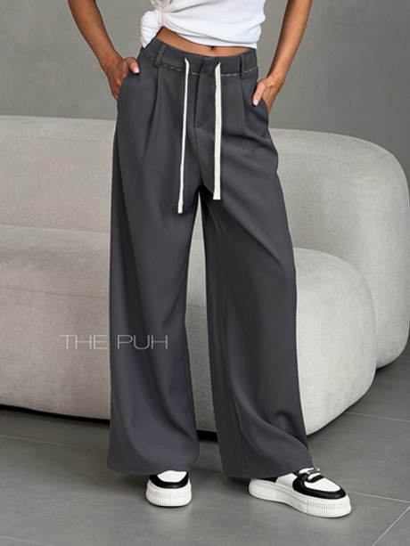 Женские брюки свободного кроя серого цвета