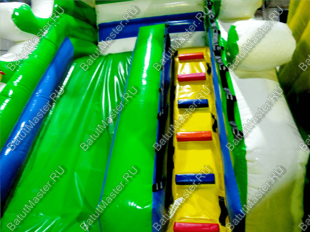 Коммерческий батут "Белый клык" желто-зелёный с механизированной головой, размер 6*5*4 м