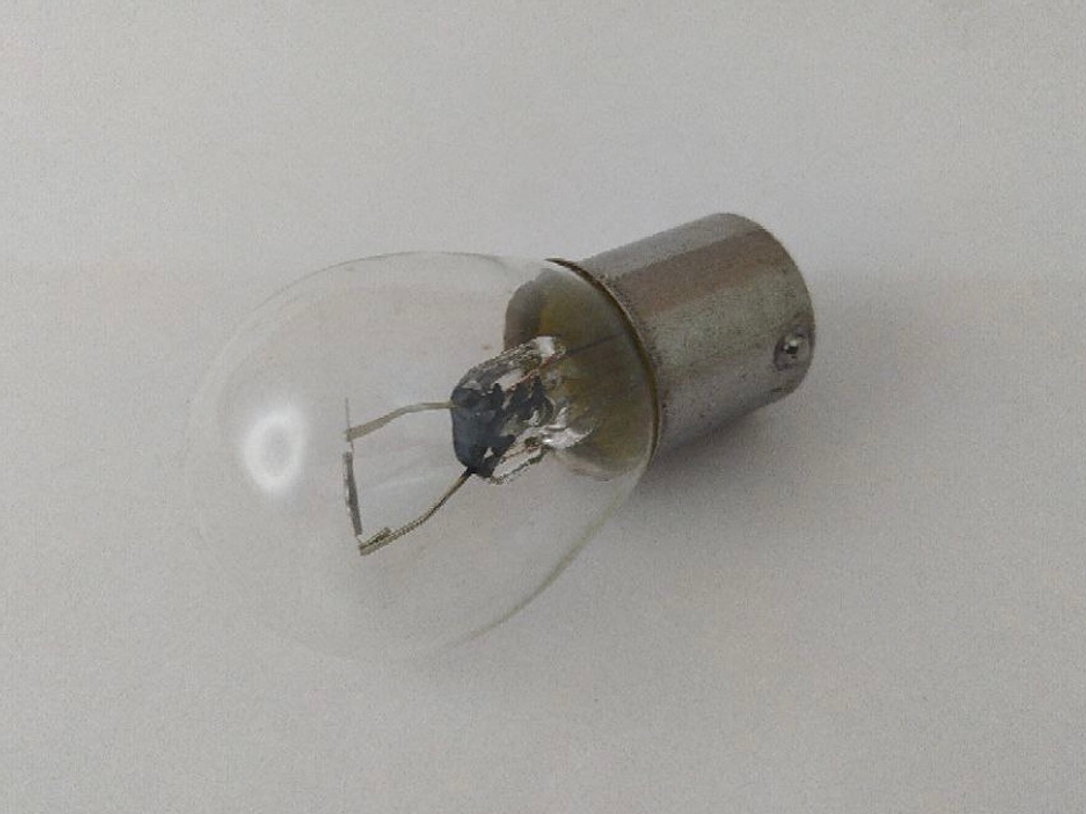 Лампа накаливания P21W (12V) 142936 TESLAFT (металлический цоколь)