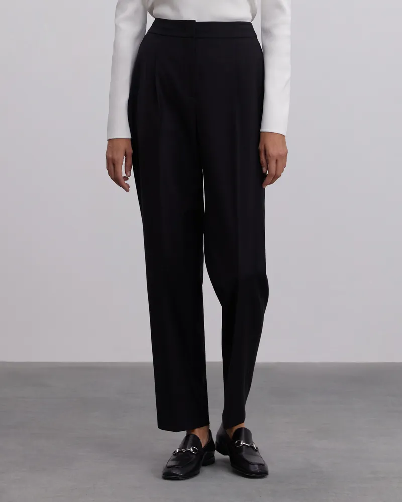 Брюки из шерсти зауженные к низу