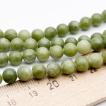 Серпентин бусины, диаметр около 6,4-6,6 мм, цена за 28-29 шт (1/2 нити)