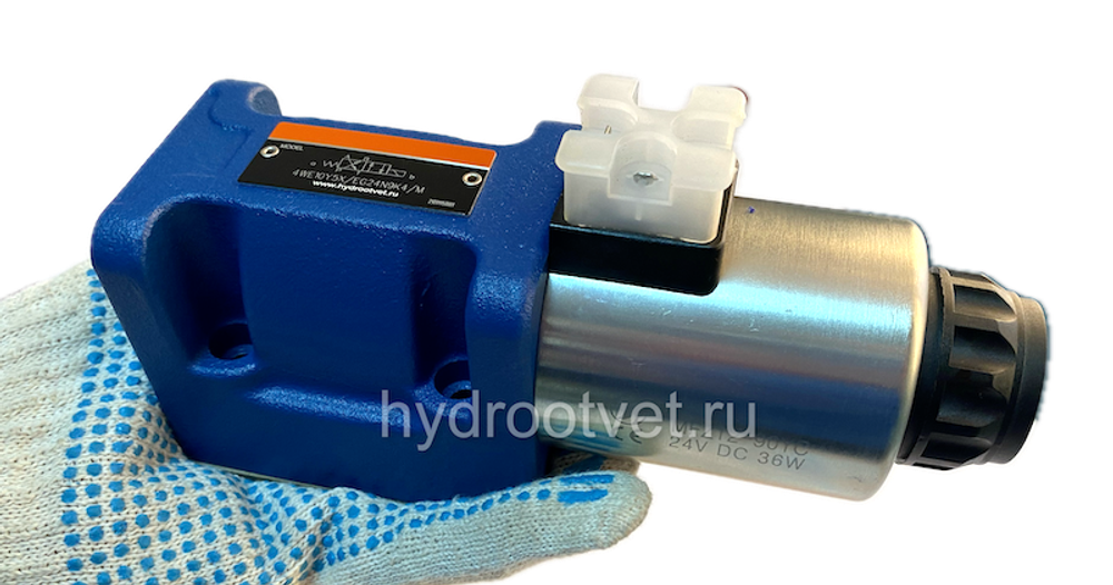 4WE10UA5X/EG24N9K4/M -  Гидрораспределитель золотниковый Ду 10 (серия 5X) с электроуправлением G24, схема UA (134-1), возврат - пружинный