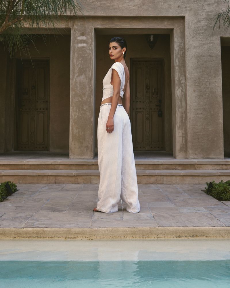 Брюки в полоску белые