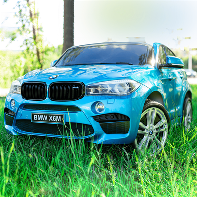 Детский двухместный электромобиль "BMW X6M" JJ2199 12V