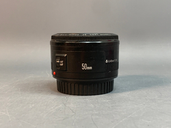 Canon 50mm 1.8 пылинки внутри