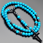 Бусы из камней гематита и бирюзы с крестом из гематита "Rico la Cara" AMX000118