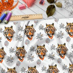 Ткань кулирная гладь головы тигров и эскизы листьев на белом фоне