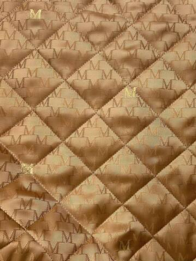 Подкладочная ткань стеганая вискоза с холлофайбером Max Mara кэмел с золотыми буквами