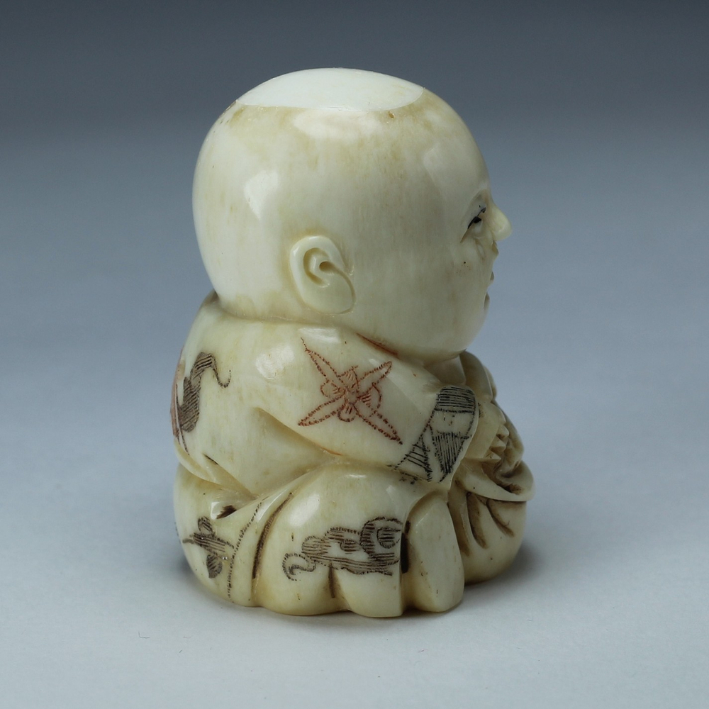 Нэцкэ Ребенок с мешком риса