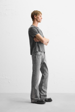 Джинсы flared fit