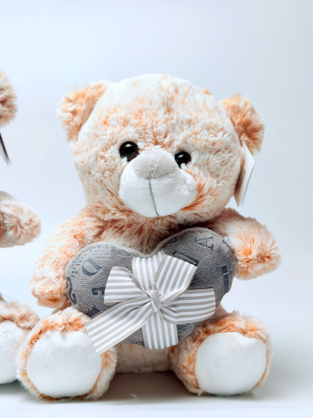 Мягкая игрушка "Мишка с сердцем" 25 см оптом.