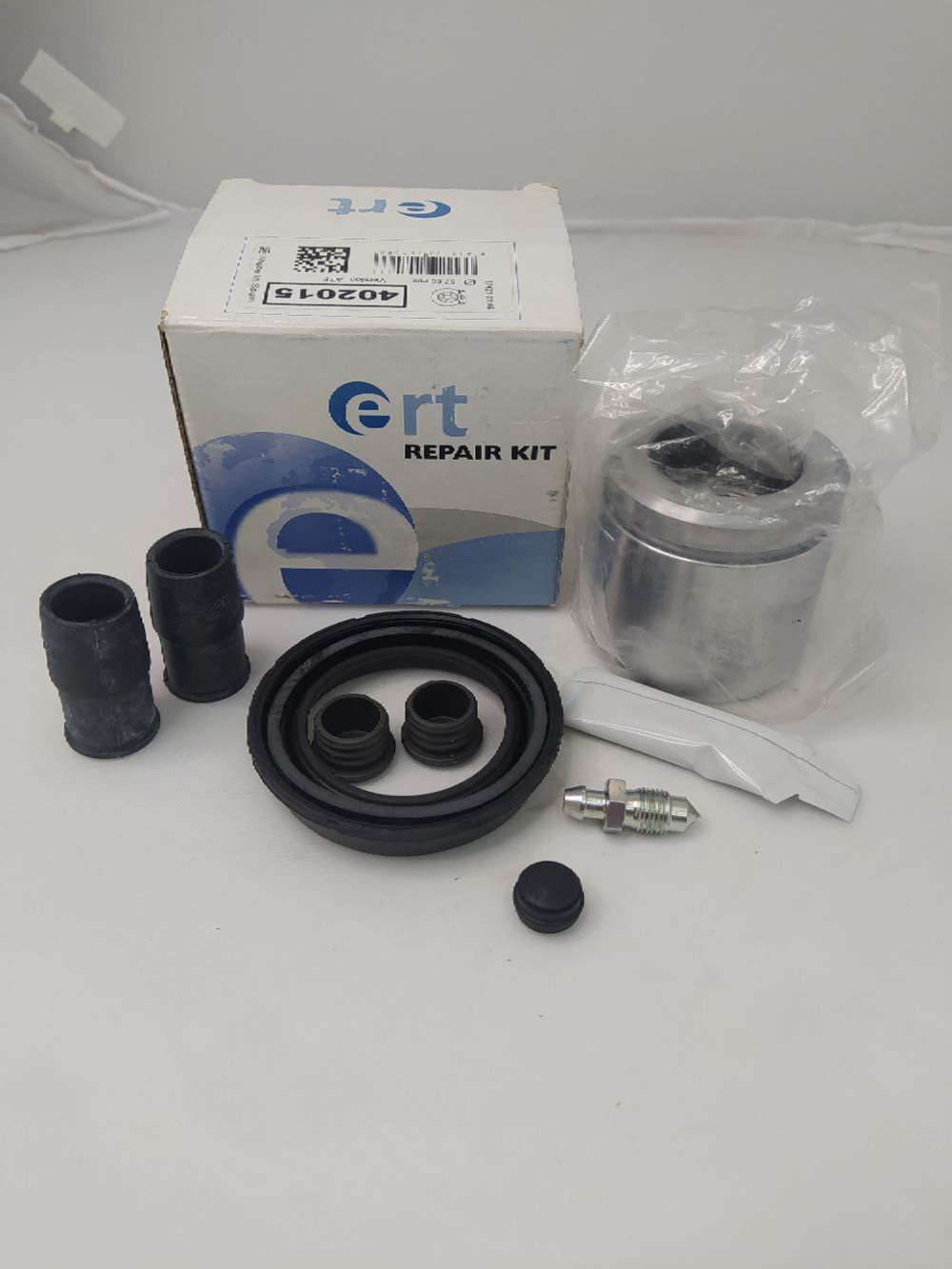 Ремкомплект переднего тормозного суппорта (с поршнем) арт. 402015 ERT