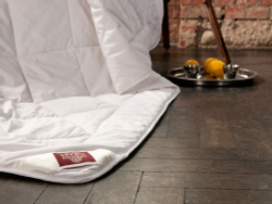 Элитное одеяло всесезонное 200х220 Merino Wool от German Grass фрагмент