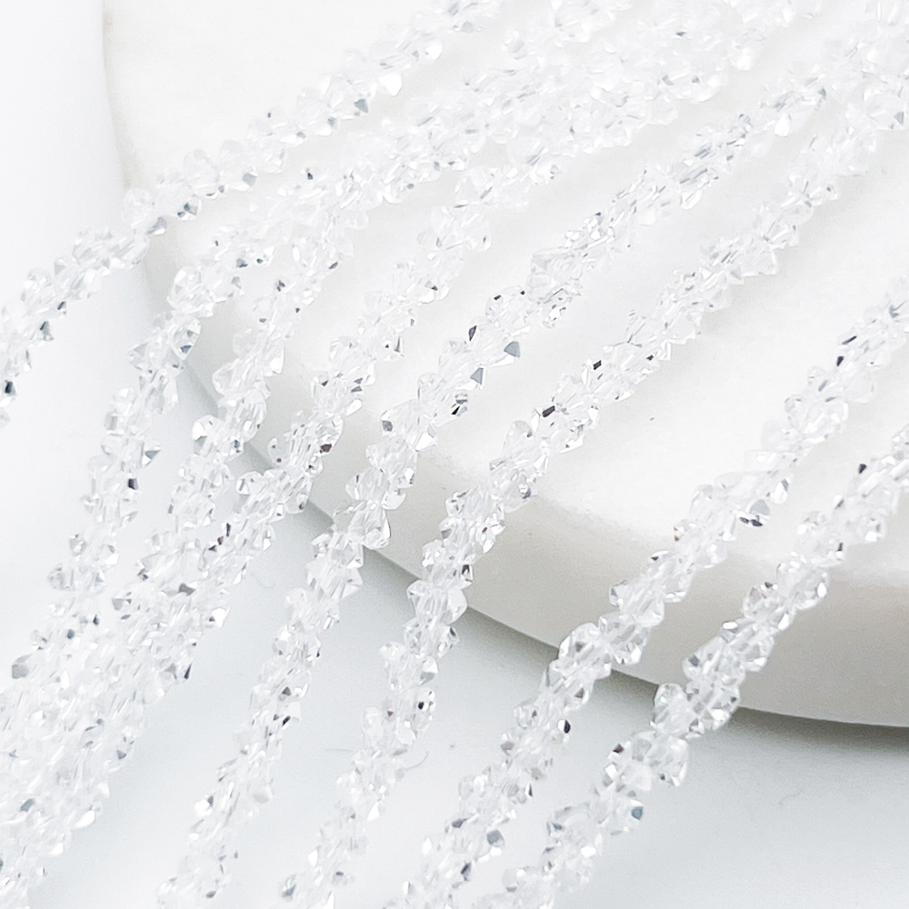 Бусина Треугольник, стекло, цвет прозрачный, размер около 2*3 мм, цена за нить 25 см