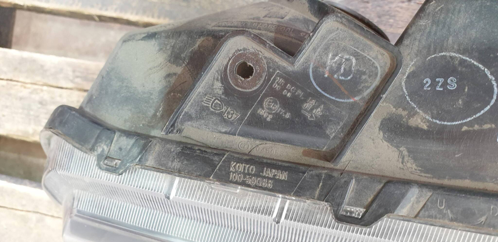 Фара левая ксенон Suzuki Grand Vitara 2 (JT) 05-15 Б/У Оригинал 10059088