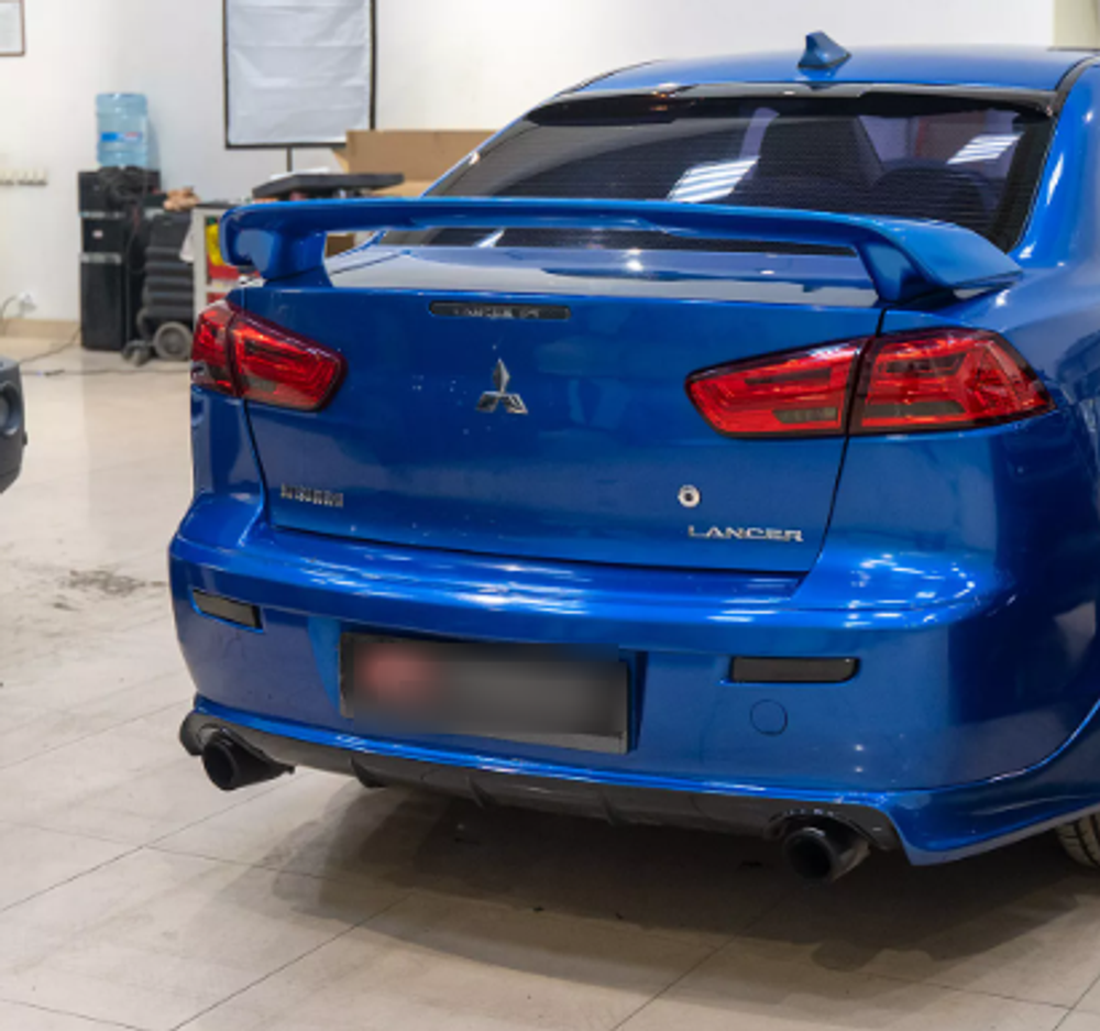 Юбка заднего бампера Zodiac Mitsubishi Lancer 10