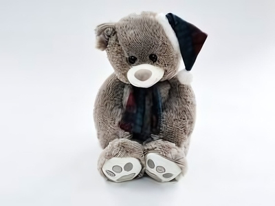 Медведь в шапке и шарфе 30x50x42см.