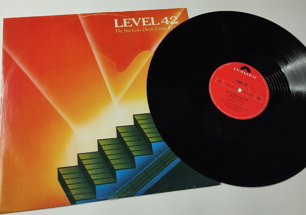 Винтажная виниловая пластинка LP Level 42 The Sun Goes Down (Living It Up) (UK 1983) 45 RPM Maxi Single