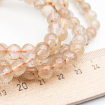 Кварц рутиловый бусины, диаметр около 7-7,3 мм, цена за 13 шт (1/4 нити)