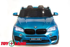 Детский электромобиль Toyland BMW X6M синий фото №2
