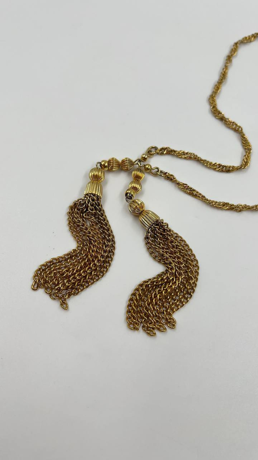 Кулон с кистями