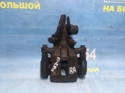 Суппорт тормозной задний правый Honda INSPIRE 1995