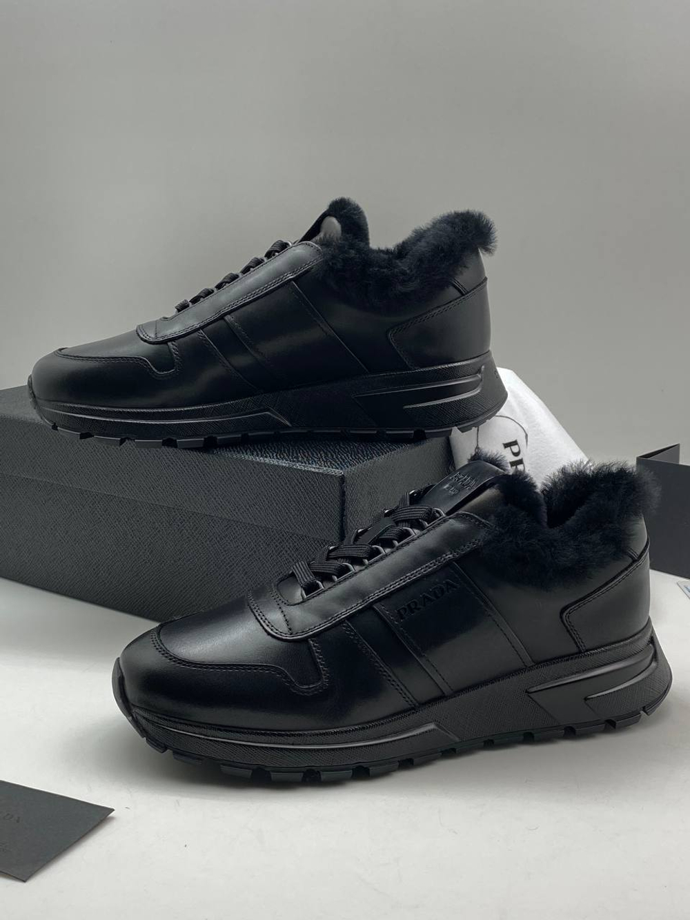 Кроссовки Prada