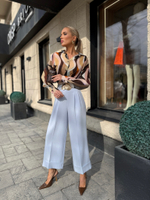 Брюки-кюлоты с отворотами и широким поясом