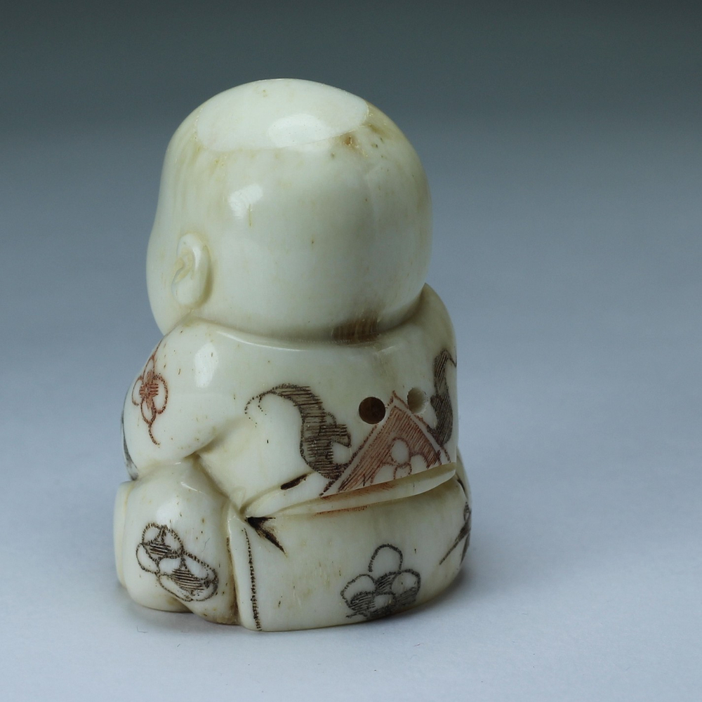 Нэцкэ Ребенок с мешком риса