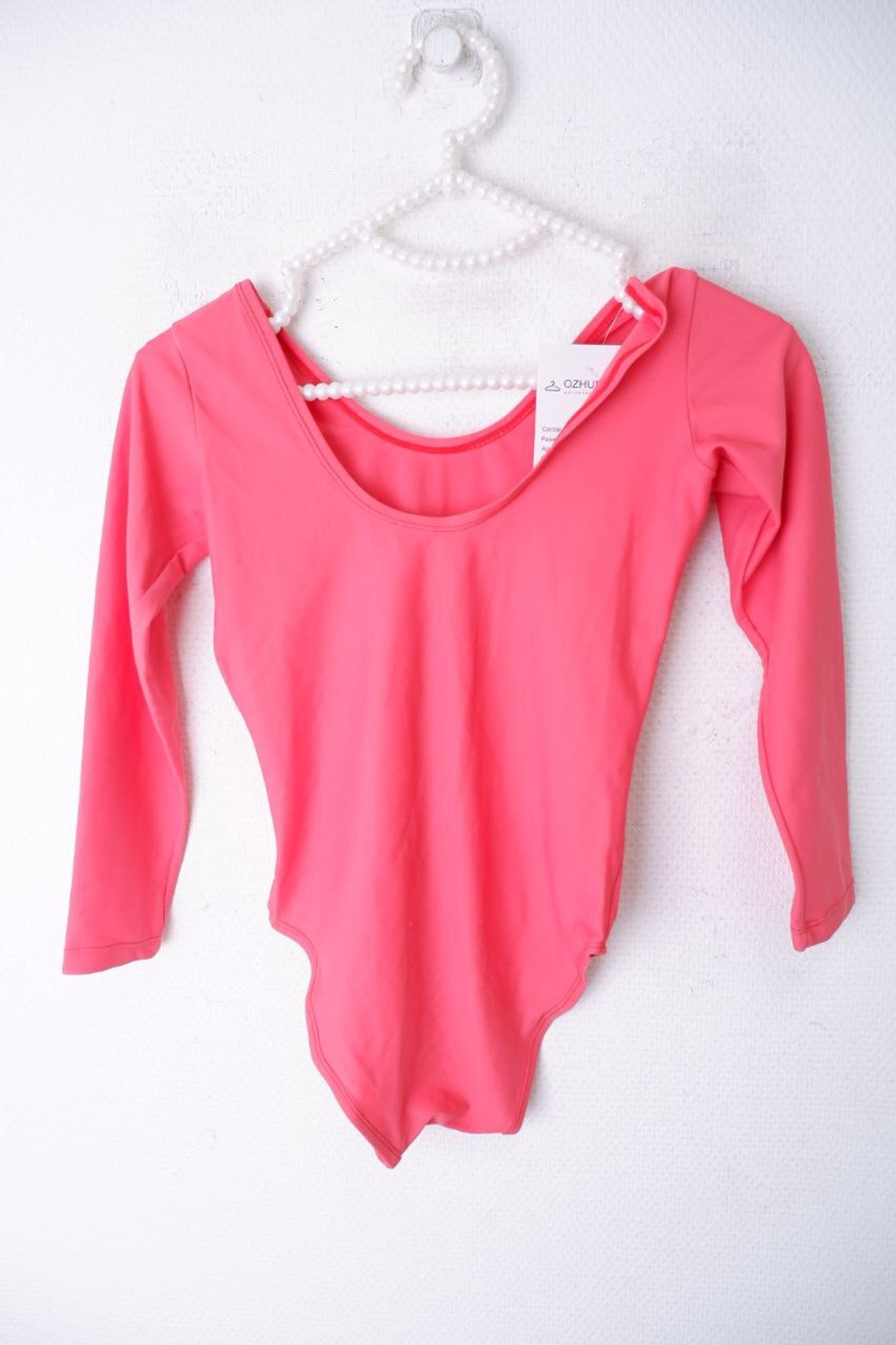 Боди нежного цвета на 9-10 лет