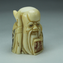 Нэцкэ Шоусин с посохом и иероглифом счастье