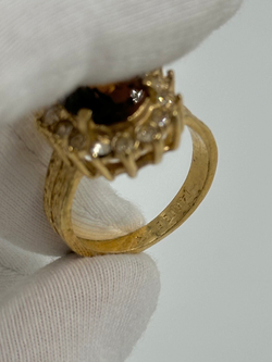 Кольцо с коричневым кристаллом