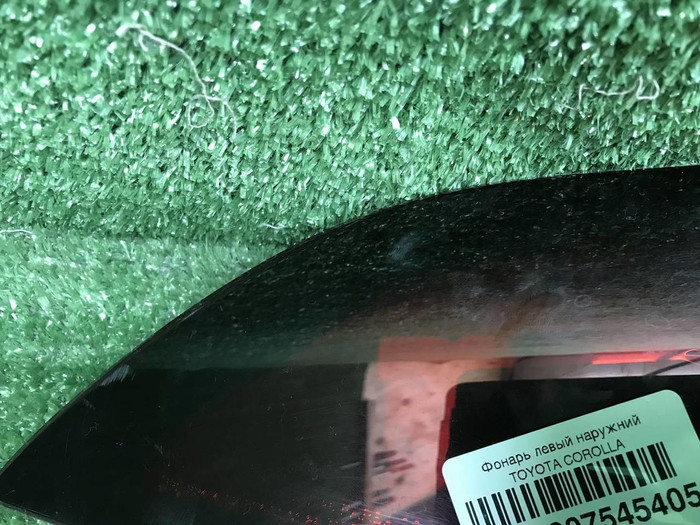 Фонарь левый внешний Toyota Corolla Е210 (18-нв)