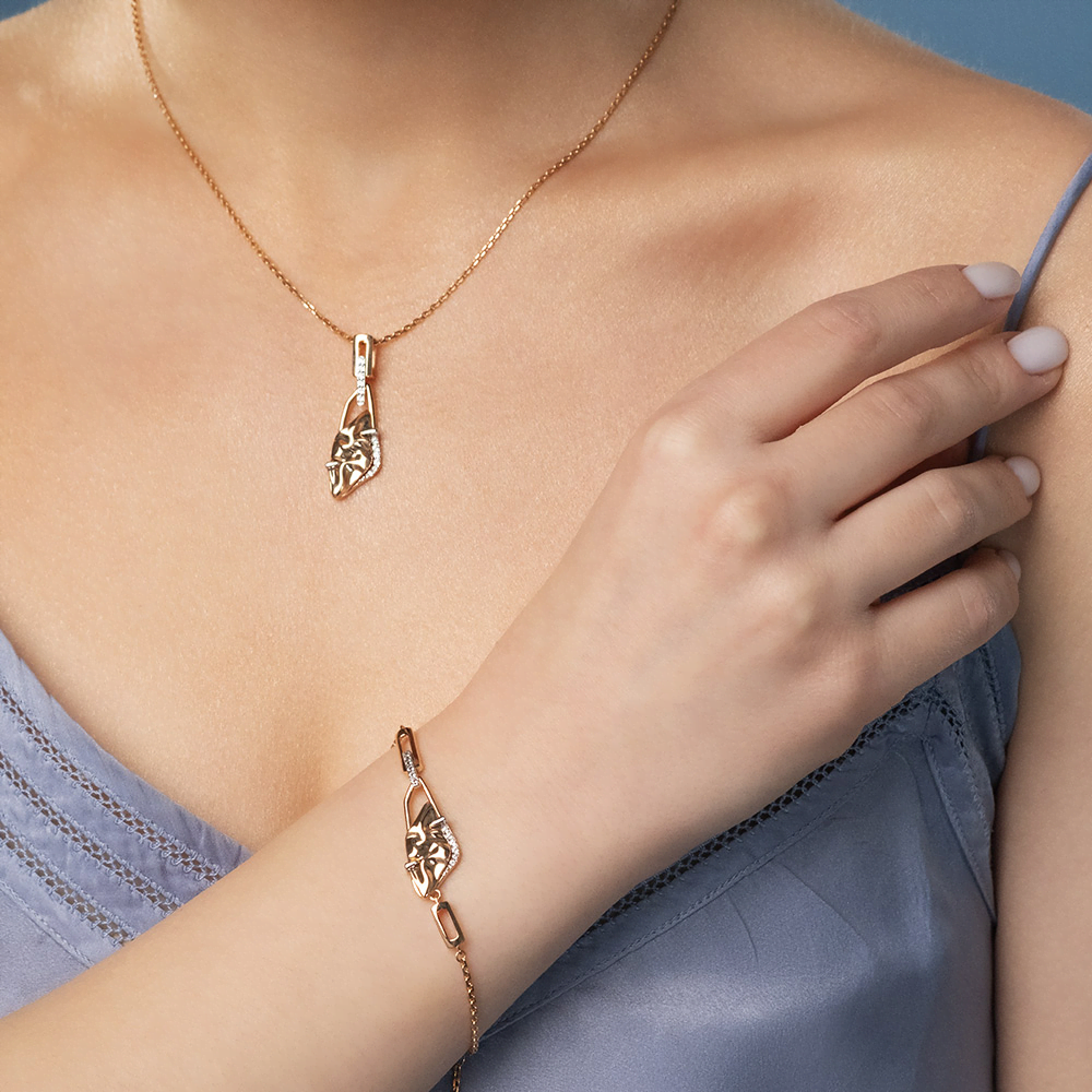 Подвеска «Загадочность» из комбинированного золота с натуральными топазами white