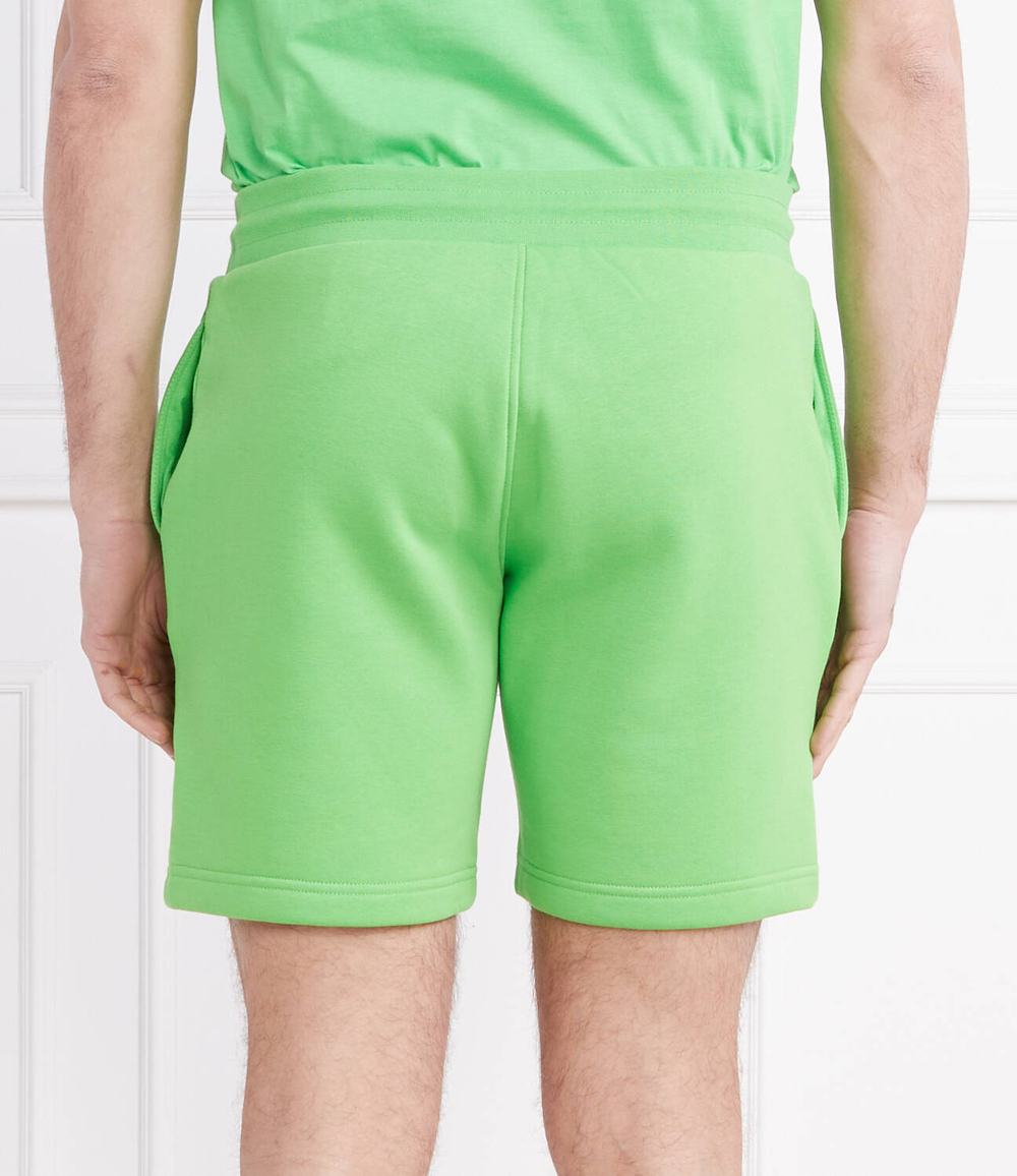 шорты hilfiger curve logo sweatshort Tommy Hilfiger - зеленый(MW0MW30014)