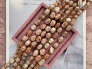 Нить бусин из солнечного камня 12-17мм (галтовка)