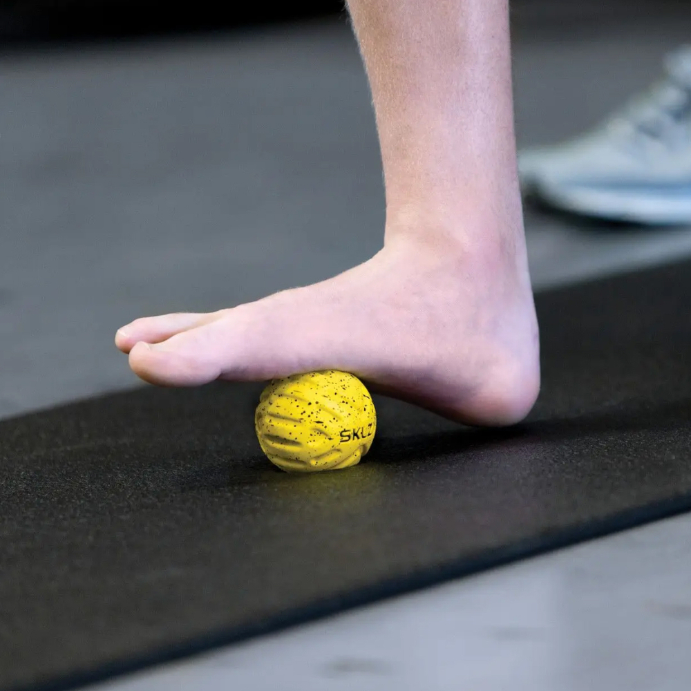 Массажный мяч желтый, 6,5 см Мяч для массажа ног SKLZ Foot Massage Ball