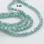 Перламутр тонированный, цвет мятный, диаметр 4,5 мм, цена за 44-45 шт (1/2 нити)