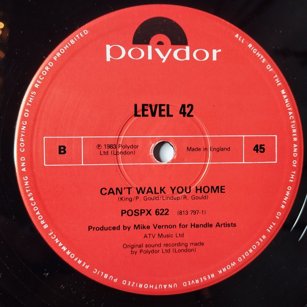 Винтажная виниловая пластинка LP Level 42 The Sun Goes Down (Living It Up) (UK 1983) 45 RPM Maxi Single