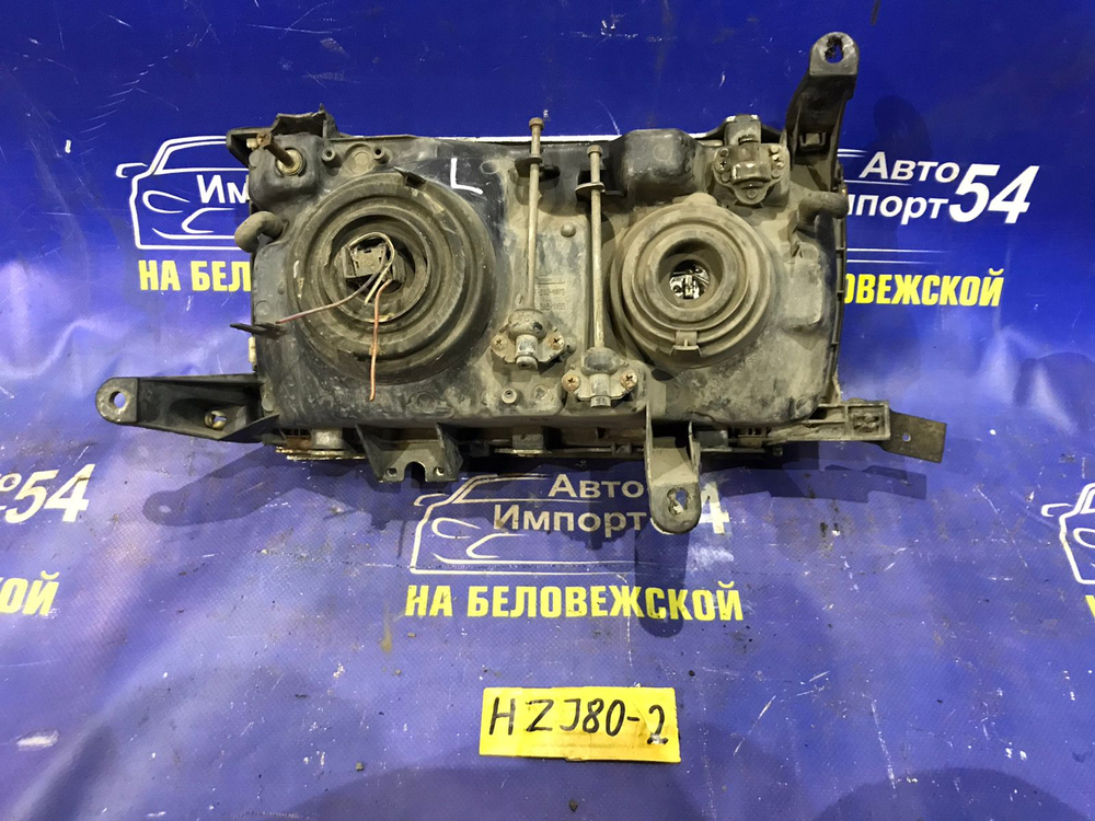 Фара передняя левая TOYOTA LAND CRUISER 1990