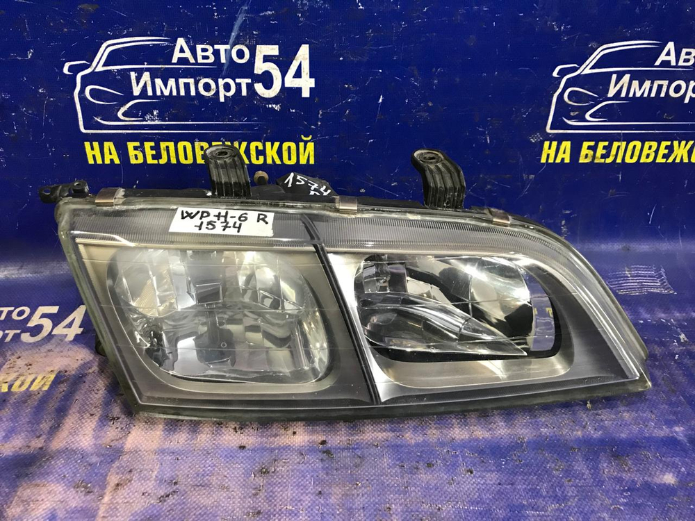 Фара передняя правая NISSAN PRIMERA 1997