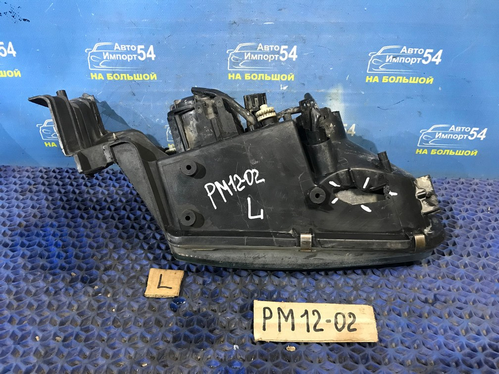 Фара передняя левая NISSAN LIBERTY 1999