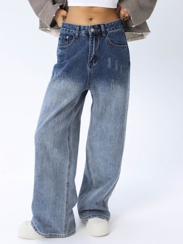 Темно-синие широкие джинсы женские