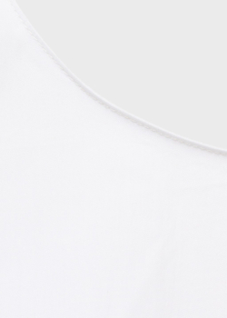 Укороченный топ с бантом на спине