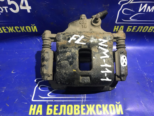 Суппорт тормозной передний левый NISSAN PRAIRIE 1993