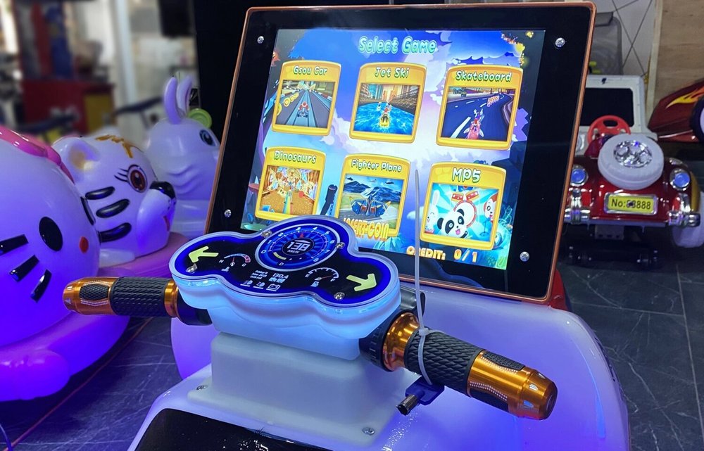 аттракцион качалка, детская качалка с видеоигрой, качалка с видео игрой для детской комнаты, дорогие качалки с игрой, автомат качалка, качалка с монетоприемником, аттракцион качалка с видео игрой