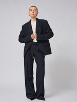 Брюки широкие с защипами в полоску